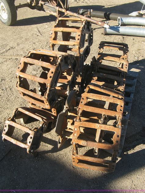 skid steer steel grouser tracks|skid loader tracks over tires.